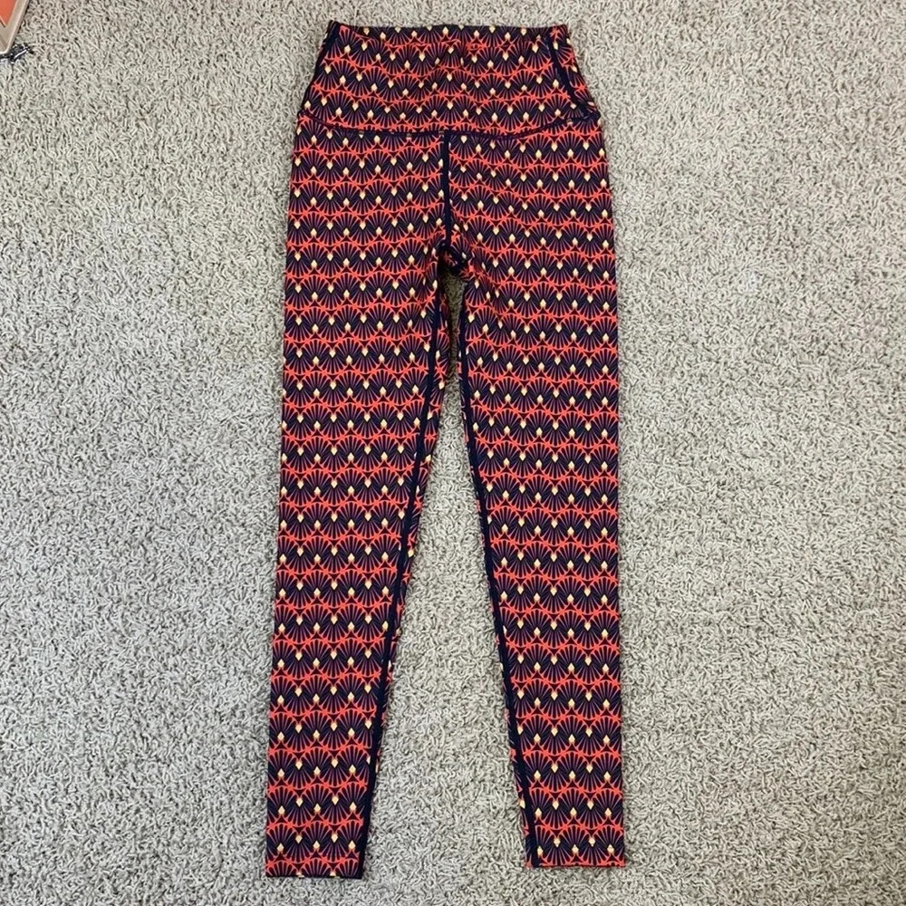NWOT Splits59 navy and orange abstract leggings sz sm